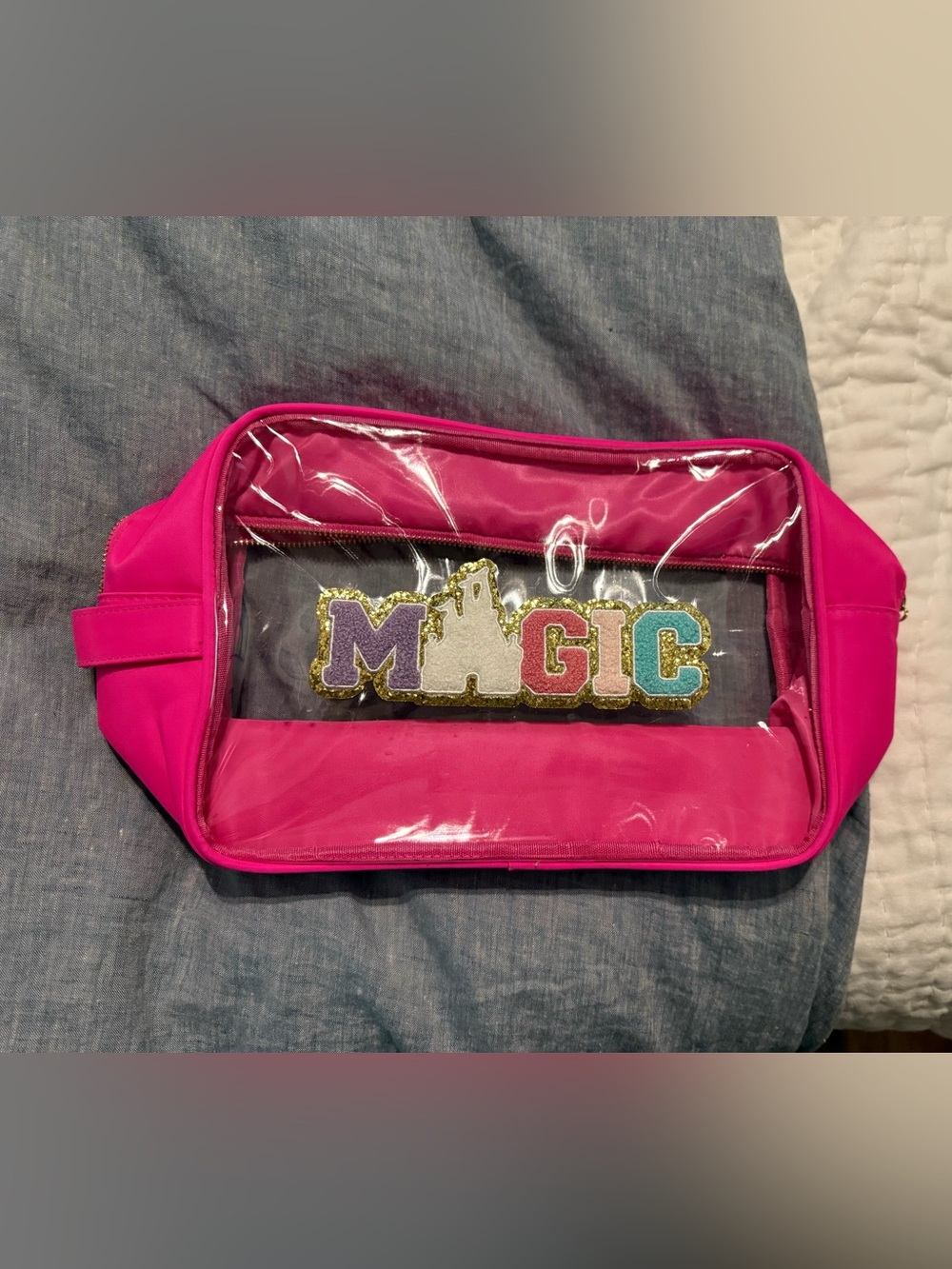 Hot pink makeup bag with Magic appliqué